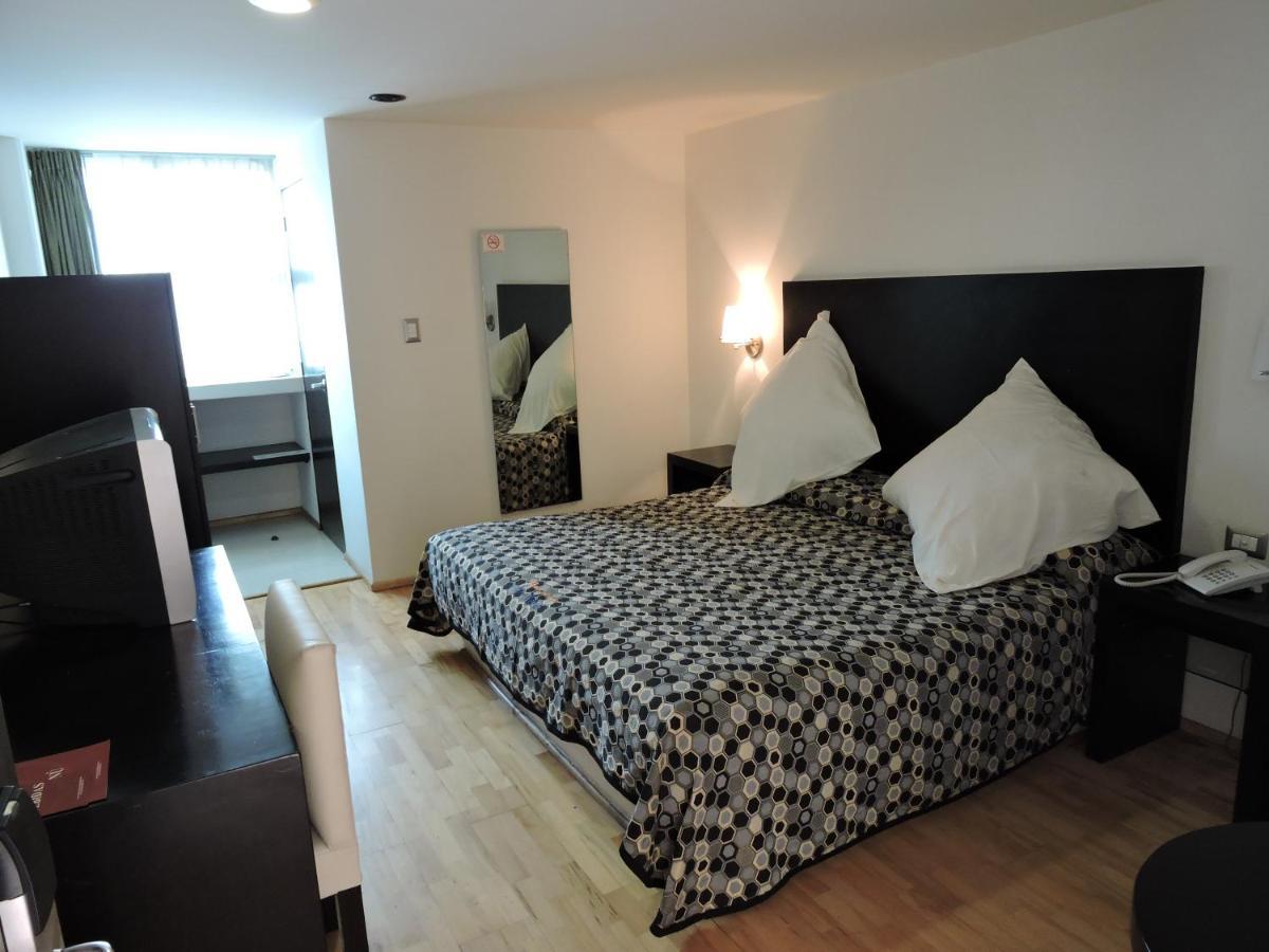 Hotel Granada ปวยบลา ภายนอก รูปภาพ